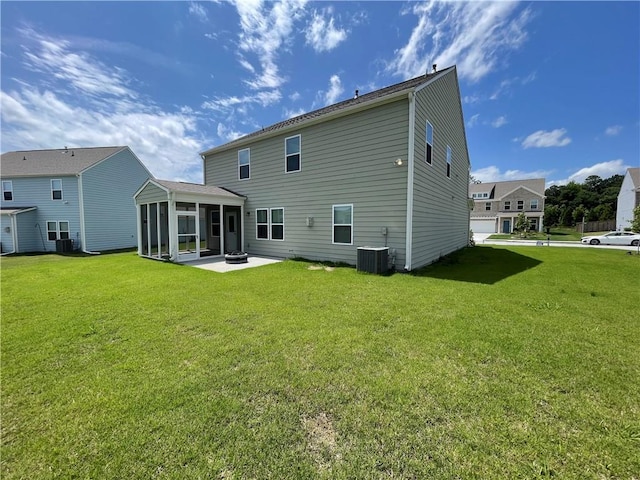 3172 Lowell Rd, Bethlehem, GA 30620 - back of property with a sunroom, a lawn, and a patio