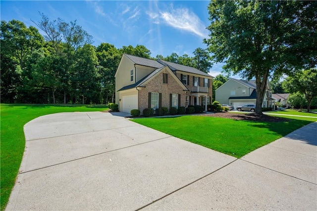 view of front facade featuring a garage, brick siding, concrete driveway, and a front yard