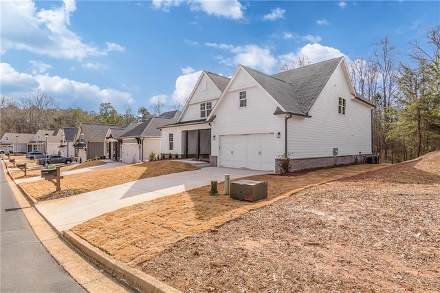 5808 Swinging Gate Rd, Gainesville, GA 30506 - view of front of property with an attached garage, driveway, and cooling unit
