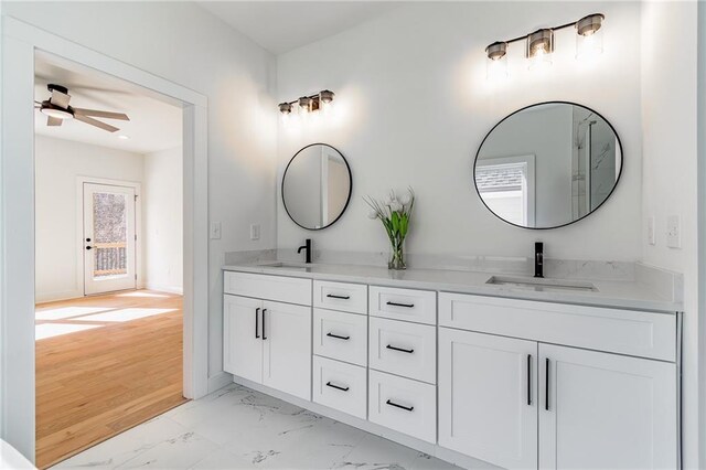 5808 Swinging Gate Rd, Gainesville, GA 30506 - full bathroom with double vanity, a sink, marble finish floor, and ceiling fan