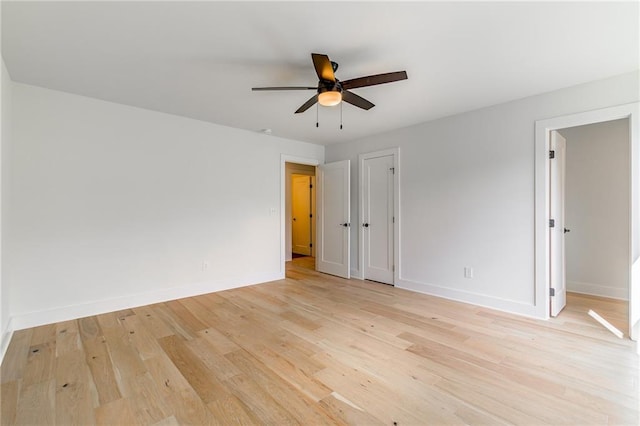 5808 Swinging Gate Rd, Gainesville, GA 30506 - unfurnished bedroom featuring baseboards, ceiling fan, and light wood-style floors