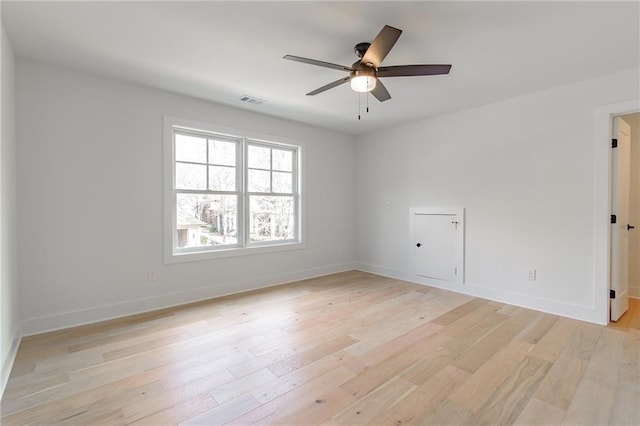 5808 Swinging Gate Rd, Gainesville, GA 30506 - empty room with baseboards, a ceiling fan, and light wood-style flooring