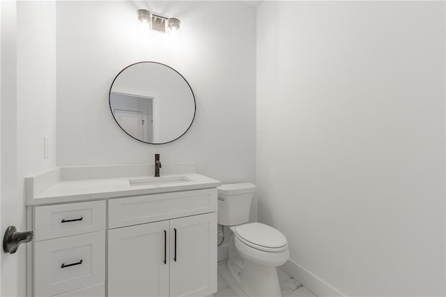 5808 Swinging Gate Rd, Gainesville, GA 30506 - bathroom featuring toilet, baseboards, marble finish floor, and vanity