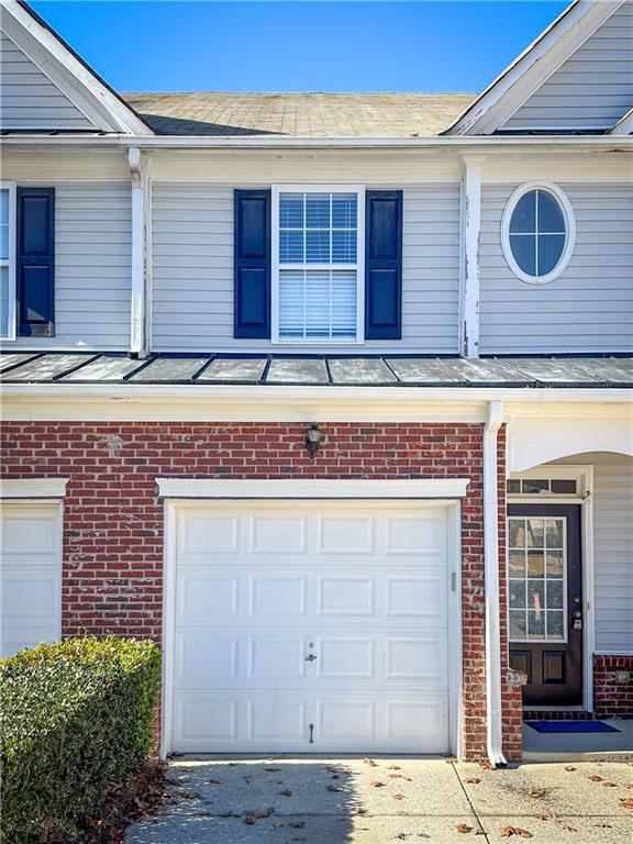 exterior space with a garage