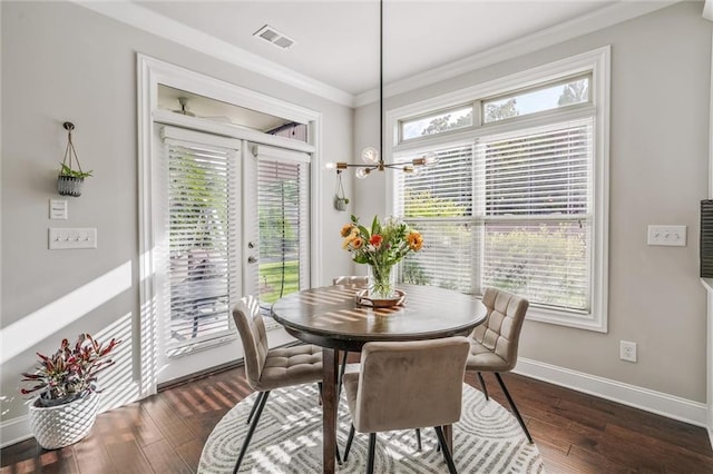 1055 Peyton View Ct, Alpharetta, GA 30004 - dining room with crown molding, dark wood-style floors, and baseboards