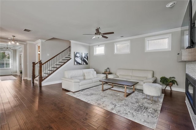 1055 Peyton View Ct, Alpharetta, GA 30004 - living area with stairs, ornamental molding, baseboards, and dark wood-type flooring