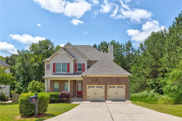 craftsman inspired home with a garage and a front yard