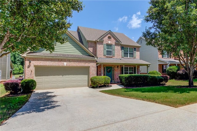 3370 Battlement Cir, Loganville, GA 30052 - view of front of house featuring brick siding, driveway, a garage, and a front lawn
