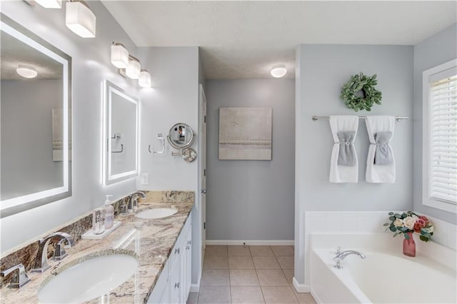 3370 Battlement Cir, Loganville, GA 30052 - full bath with tile patterned floors, double vanity, and a garden tub