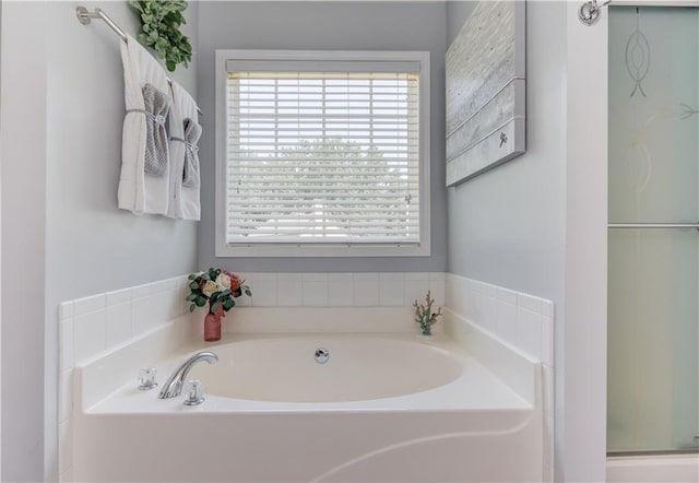 3370 Battlement Cir, Loganville, GA 30052 - full bathroom featuring a bath and an enclosed shower