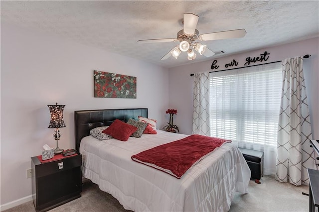 3370 Battlement Cir, Loganville, GA 30052 - carpeted bedroom featuring a textured ceiling and ceiling fan