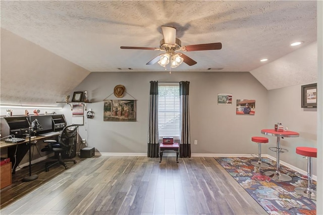 3370 Battlement Cir, Loganville, GA 30052 - office featuring a textured ceiling, vaulted ceiling, ceiling fan, hardwood / wood-style floors, and recessed lighting