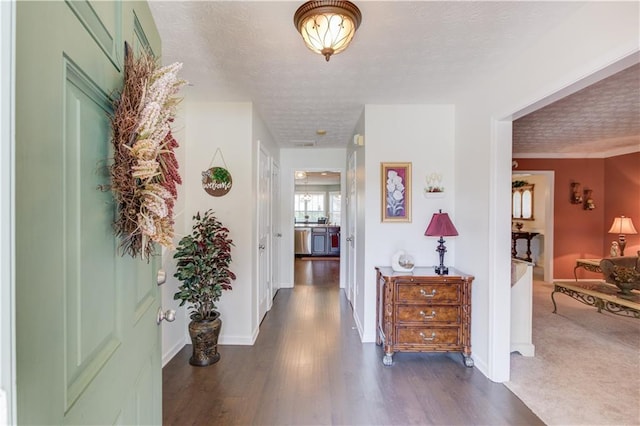 3370 Battlement Cir, Loganville, GA 30052 - hallway featuring a textured ceiling and dark wood-type flooring