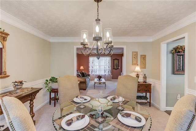 3370 Battlement Cir, Loganville, GA 30052 - carpeted dining room featuring a chandelier, a textured ceiling, and crown molding