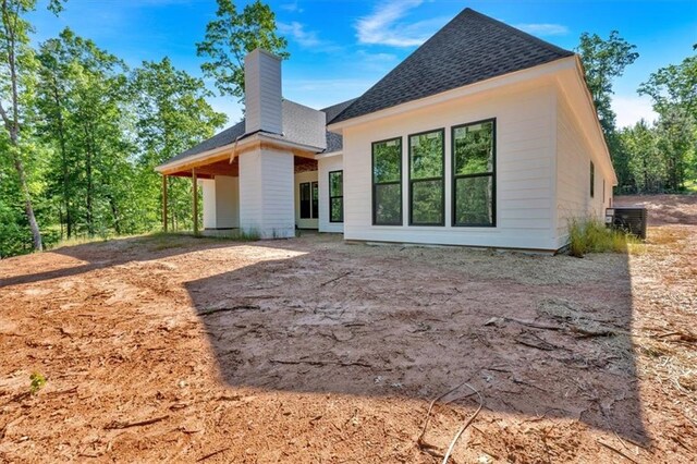 107 Marks Way, Canton, GA 30115 - view of side of home featuring roof with shingles