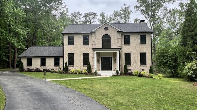 805 Wesley Oak Rd, Sandy Springs, GA 30328 - view of front of home featuring a front yard, brick siding, and a chimney