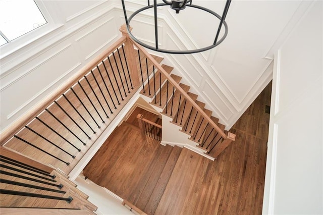 805 Wesley Oak Rd, Sandy Springs, GA 30328 - staircase featuring wood finished floors and a decorative wall
