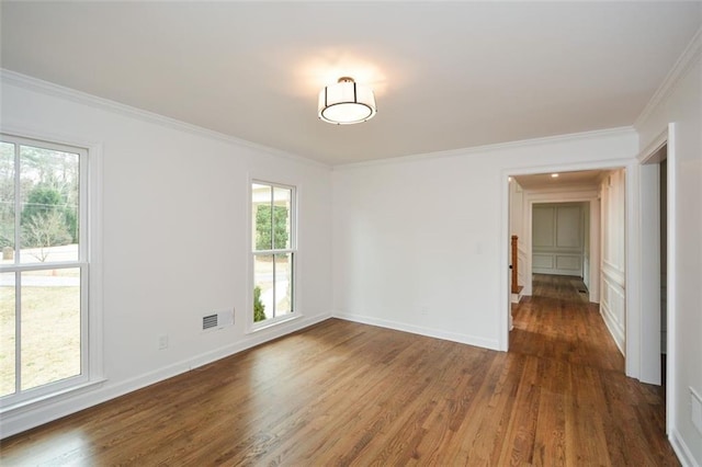 805 Wesley Oak Rd, Sandy Springs, GA 30328 - spare room featuring ornamental molding and wood finished floors