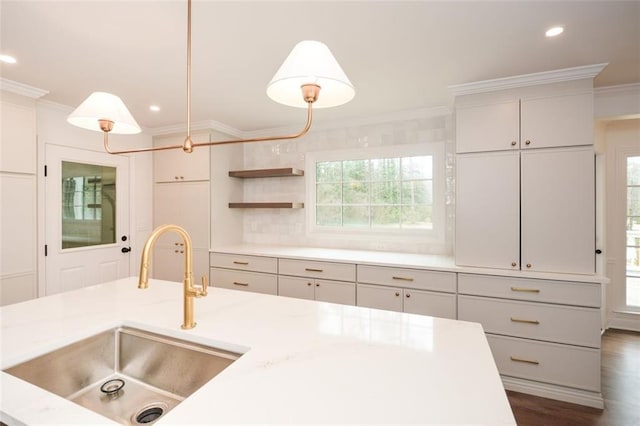 805 Wesley Oak Rd, Sandy Springs, GA 30328 - kitchen with ornamental molding, plenty of natural light, light countertops, recessed lighting, and hanging light fixtures
