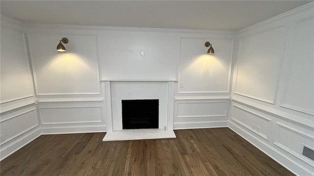 805 Wesley Oak Rd, Sandy Springs, GA 30328 - unfurnished living room with a decorative wall, dark wood-style floors, and a brick fireplace