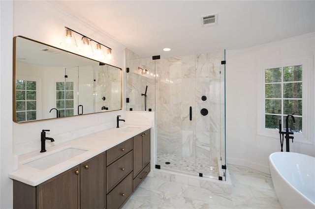805 Wesley Oak Rd, Sandy Springs, GA 30328 - bathroom featuring a freestanding tub, a marble finish shower, double vanity, marble finish flooring, and ornamental molding