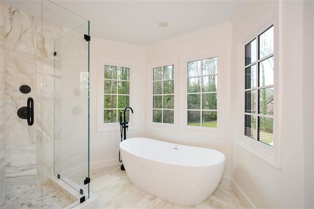 805 Wesley Oak Rd, Sandy Springs, GA 30328 - bathroom with a freestanding tub, a marble finish shower, healthy amount of natural light, and crown molding