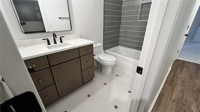 805 Wesley Oak Rd, Sandy Springs, GA 30328 - full bathroom featuring vanity, wood finished floors, and shower / washtub combination