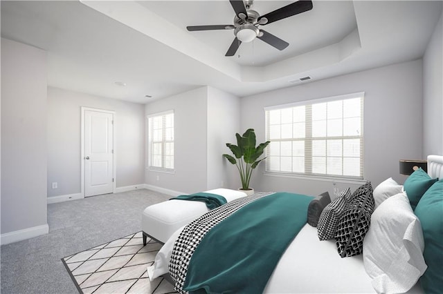 2544 Castellan Dr, Atlanta, GA 30316 - bedroom with baseboards, carpet, ceiling fan, and a tray ceiling