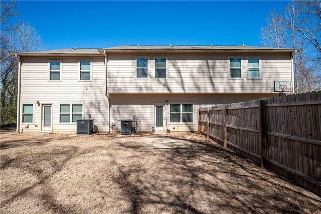 2544 Castellan Dr, Atlanta, GA 30316 - rear view of property with central air condition unit and a fenced backyard