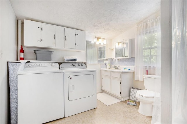 4329 Park St, Acworth, GA 30101 - laundry area featuring independent washer and dryer and a textured ceiling
