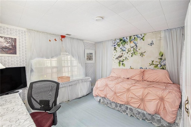4329 Park St, Acworth, GA 30101 - bedroom with wallpapered walls and wood finished floors