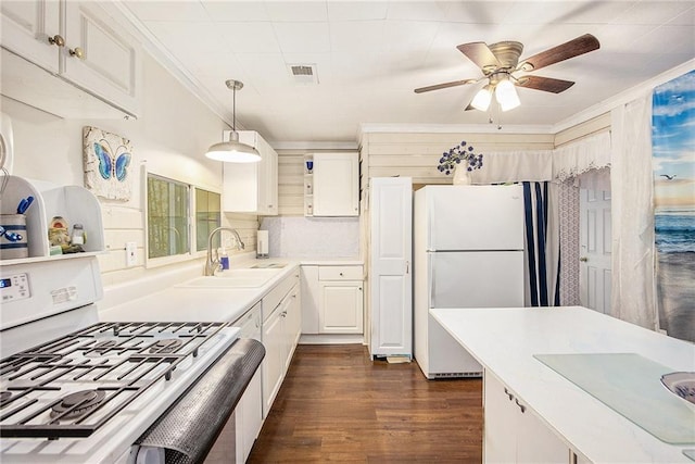 4329 Park St, Acworth, GA 30101 - kitchen featuring stove, freestanding refrigerator, light countertops, ceiling fan, and white cabinets
