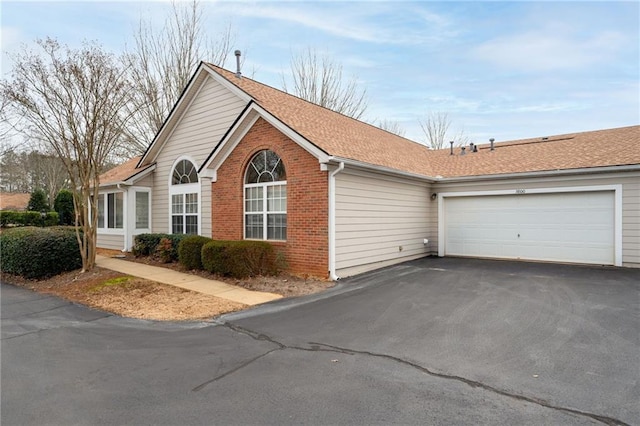 view of property exterior featuring a garage