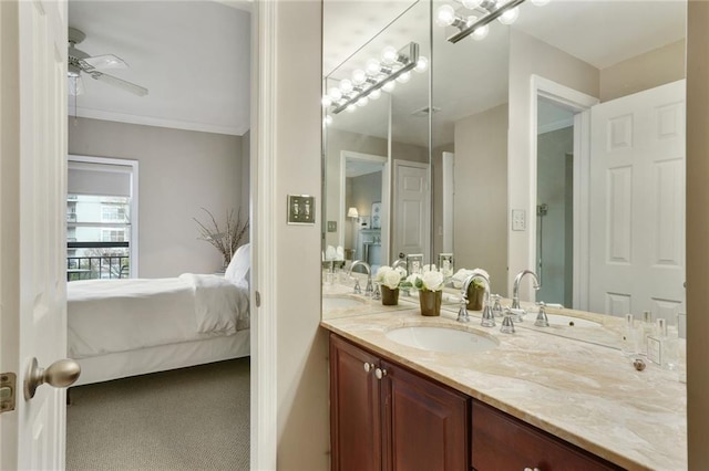 bathroom featuring crown molding, connected bathroom, vanity, and a ceiling fan