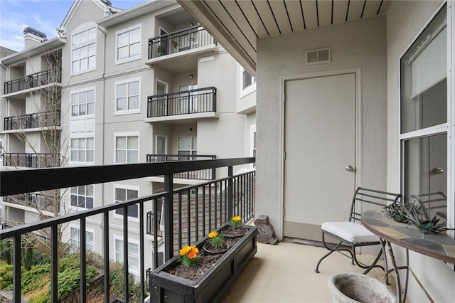 balcony featuring visible vents
