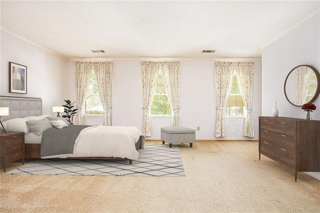 bedroom featuring ornamental molding, carpet, and baseboards