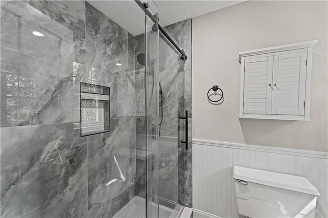 220 Hollyridge Dr, Roswell, GA 30076 - full bathroom featuring a wainscoted wall and a marble finish shower