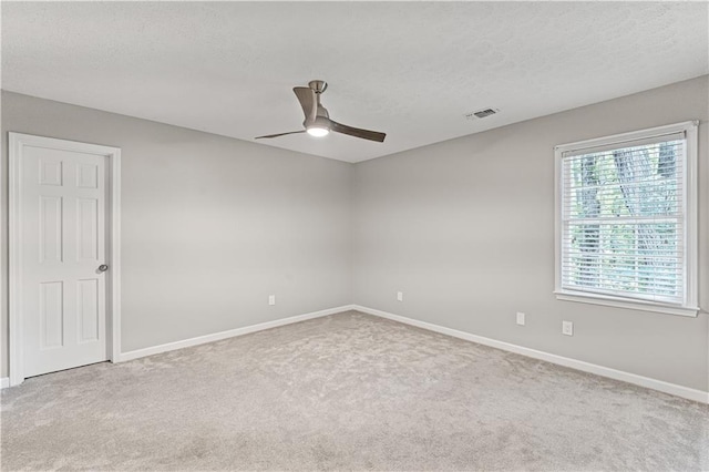 220 Hollyridge Dr, Roswell, GA 30076 - spare room with carpet, ceiling fan, and a textured ceiling