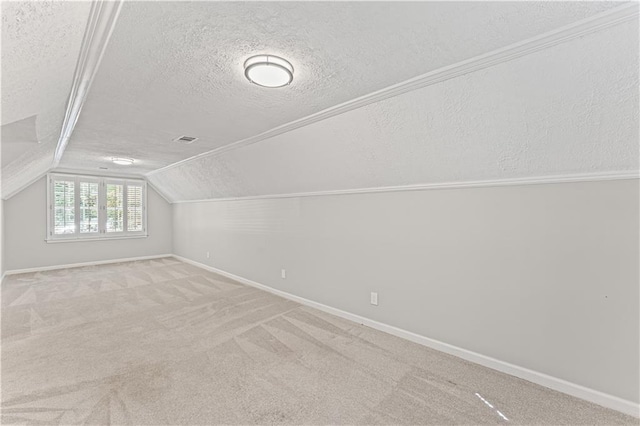 220 Hollyridge Dr, Roswell, GA 30076 - bonus room featuring a textured ceiling, lofted ceiling, and carpet floors