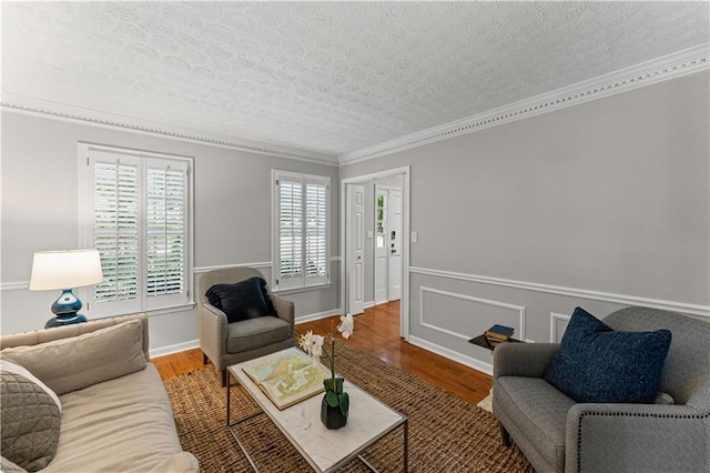 220 Hollyridge Dr, Roswell, GA 30076 - living area featuring a textured ceiling, healthy amount of natural light, wood finished floors, and crown molding