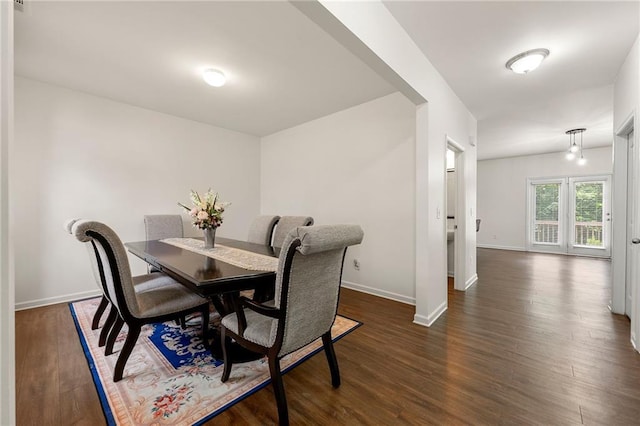 105 Arbor Creek Trl, Dallas, GA 30157 - dining space with baseboards and dark wood finished floors