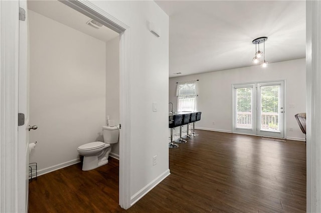 105 Arbor Creek Trl, Dallas, GA 30157 - bathroom featuring wood finished floors, toilet, and baseboards