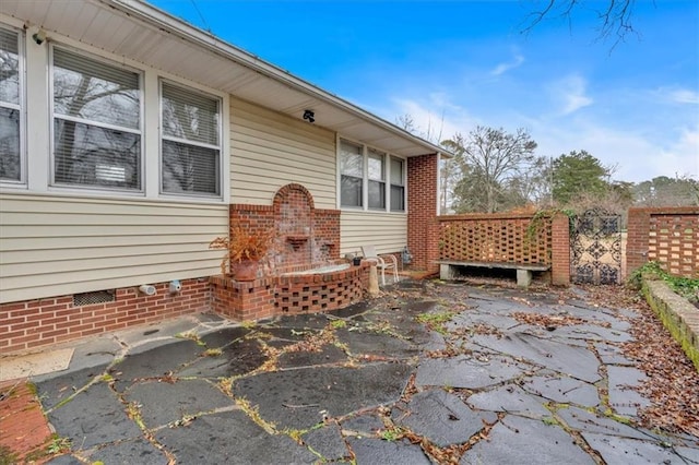 view of patio / terrace with fence