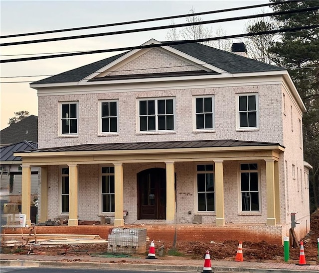 view of front of home featuring covered porch