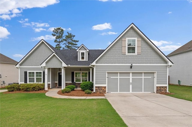 777 Tucker Trl, Bremen, GA 30110 - craftsman-style home with stone siding, concrete driveway, and a front yard