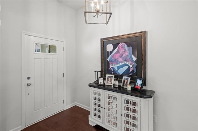 777 Tucker Trl, Bremen, GA 30110 - foyer featuring a chandelier, dark wood-style floors, and baseboards