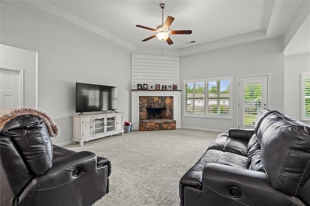 777 Tucker Trl, Bremen, GA 30110 - living area featuring a raised ceiling, a ceiling fan, plenty of natural light, and baseboards