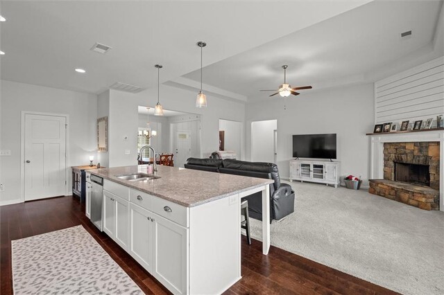 777 Tucker Trl, Bremen, GA 30110 - kitchen with a sink, dishwasher, light stone countertops, white cabinets, and recessed lighting