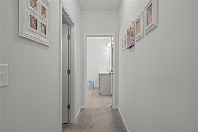 777 Tucker Trl, Bremen, GA 30110 - corridor featuring baseboards, carpet, and a sink