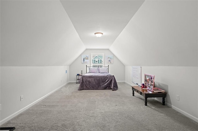 777 Tucker Trl, Bremen, GA 30110 - carpeted bedroom featuring lofted ceiling and baseboards